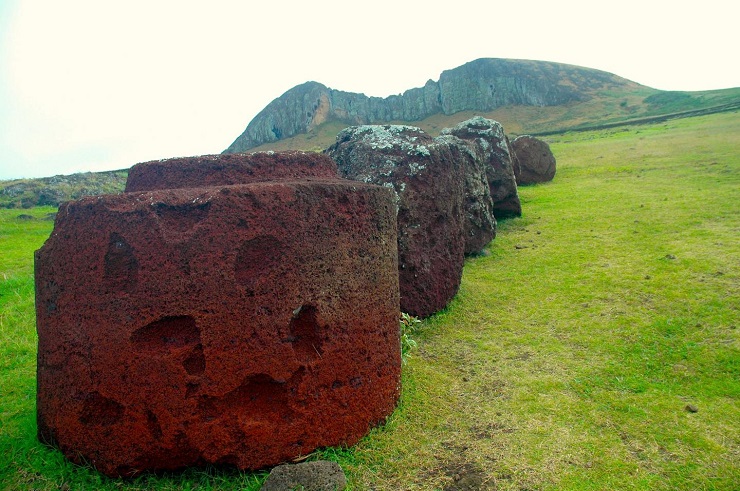 Pukao are large, cylindrical stones made from a volcanic rock known as 'red scoria.' Weighing multiple tons, they were placed on the heads of the moai during prehistoric times, consistent with the Polynesian traditions of honoring their ancestors.  CREDIT Carl LIpo