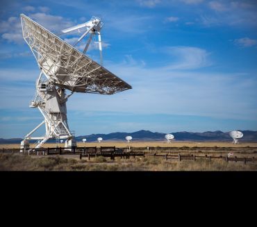 The Karl G. Jansky Very Large Array radio telescope consists of 27 giant telescope dishes (each 25 meters in diameter) in New Mexico. Image credit: Shutterstock.