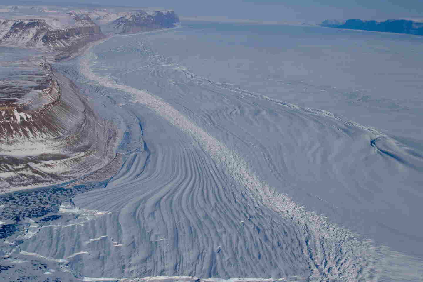 The Petermann Glacier, which accounts for about 4% of the Greenland Ice Sheet, is moving towards the Arctic Ocean. A recent study, which involved observations and supercomputer modeling, has shown that the glacier is more susceptible to warm ocean water intrusion underneath it than previously thought. This can lead to increased melting and potentially worsen future sea level rise. The study was conducted by Eric Rignot from UCI.