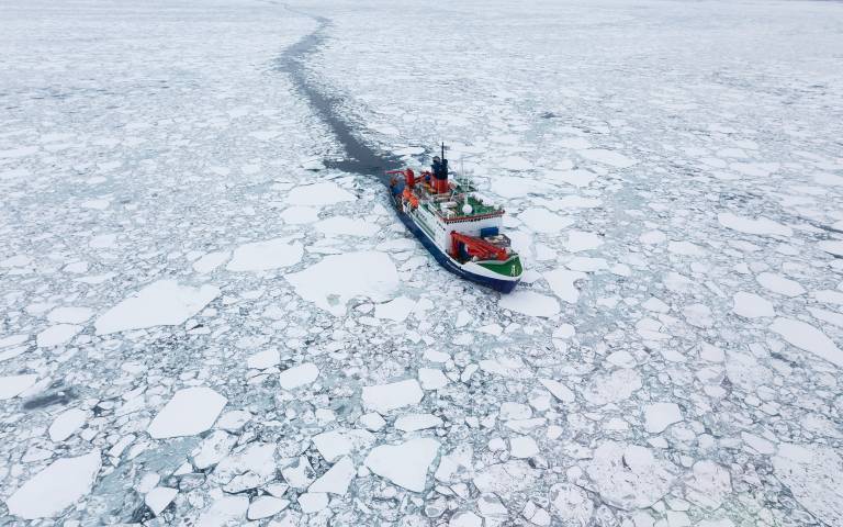 The research ship Polarstern moving through sea ice in the Arctic. Credit: Alfred-Wegener-Institut. Source: MOSAiC polar research expedition
