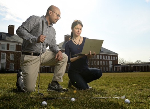 Rajat Mittal, left, a Johns Hopkins mechanical engineering professor, and Neda Yaghoobian, a visiting postdoctoral scholar, devised a supercomputer simulation to determine how wind conditions affect the of trajectory of a golf ball in flight. Photo by Will Kirk/Johns Hopkins University.