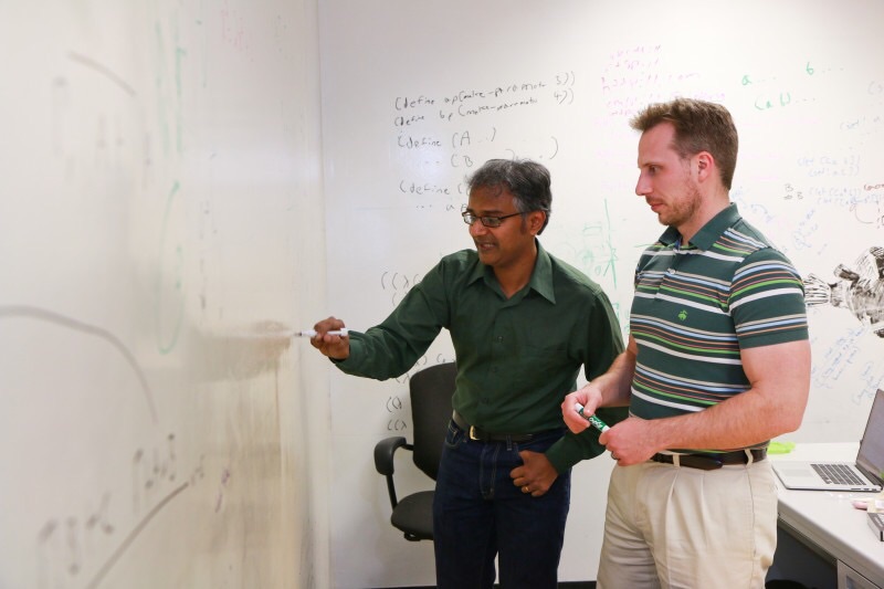 Suresh Venkatasubramanian, left, and Matt Might, both associate professors of computer science at the University of Utah, have received a $3 million government grant to produce software that can sniff out the next generation of computer vulnerabilities. These attacks, called algorithmic vulnerabilities, are harder to detect and can do a great amount of damage on computer systems.