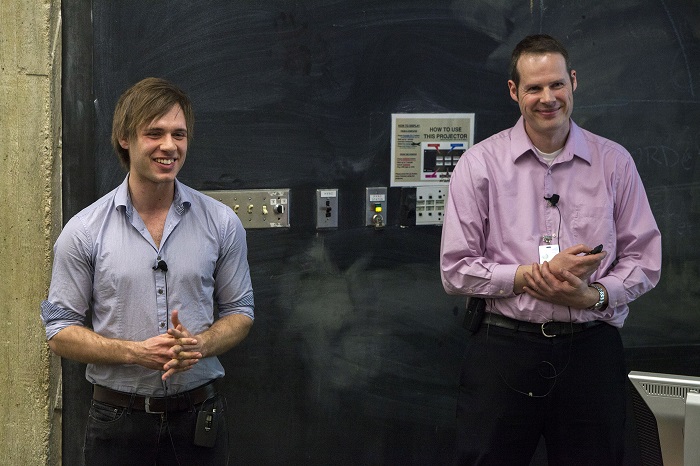 Matteo Cremonesi, left, of the University of Oxford and the CDF collaboration, and Reinhard Schwienhorst of Michigan State University and the DZero collaboration present the joint discovery at a forum at Fermilab on Friday, Feb. 21. The two collaborations have observed the production of single top quarks in the s-channel, as seen in data collected from the Tevatron.