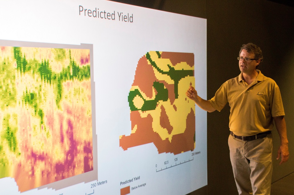 Phillip R. Owens, Purdue University associate professor of agronomy, demonstrates how a farmer's field can be mapped to show predicted crop yield with his technology. His functional soil mapping technology is available for licensing and developing through the Purdue Office of Technology Commercialization.