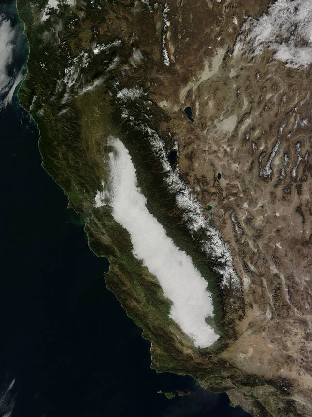 Clouds form over the California coast in 2002. (Jacques Descloitres, NASA/GSFC)