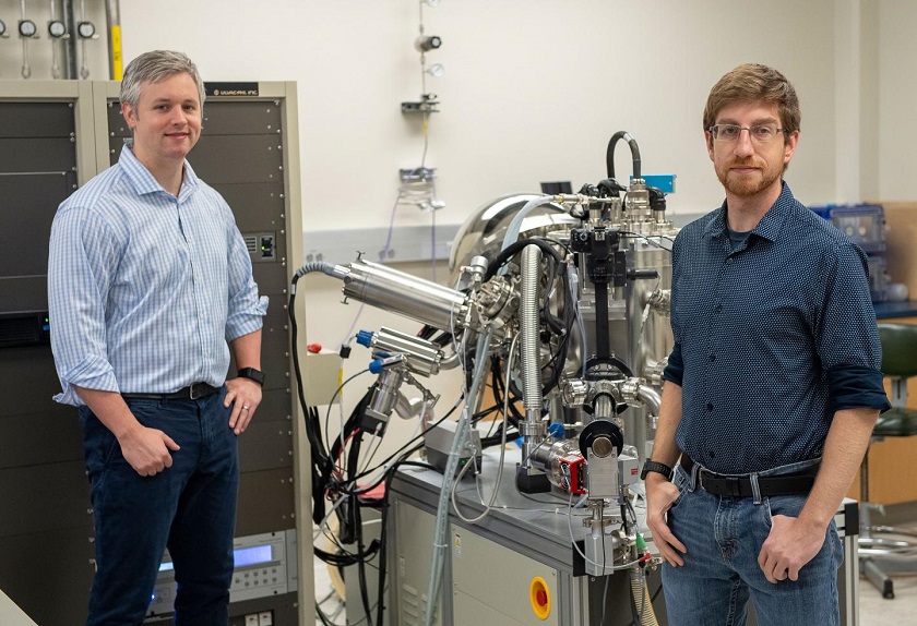 CAPTION U.S. Army Research Laboratory scientists Dr. David Baker and Dr. Joshua McClure pose in their lab at the Adelphi Laboratory Center, where they are working to lighten the load and enhance the power of Soldier devices used on the battlefield.  CREDIT (U.S. Army Photo by Jhi Scott)