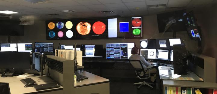 CAPTION NOAA's Space Weather Prediction Center in Boulder, Colo.  CREDIT Photo: Katie Palubicki/ CIRES & NOAA National Centers for Environmental Information.