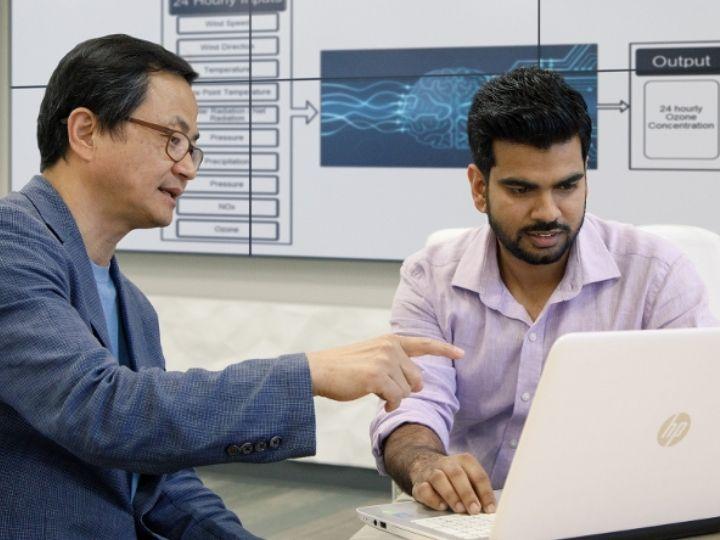 University of Houston Professor Yunsoo Choi and doctoral student Alqamah Sayeed study atmospheric data.