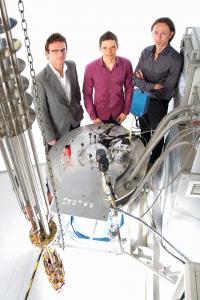 Project leaders Andrew Dzurak (left) and Andrea Morello (right), with Ph.D. student and lead author Jarryd Pla (centre).