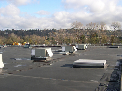 PNNL researchers found commercial buildings could substantially cut their power bills if they retrofitted their packaged rooftop heating, ventilation and air-conditioning units, such as those shown here in the Seattle area.