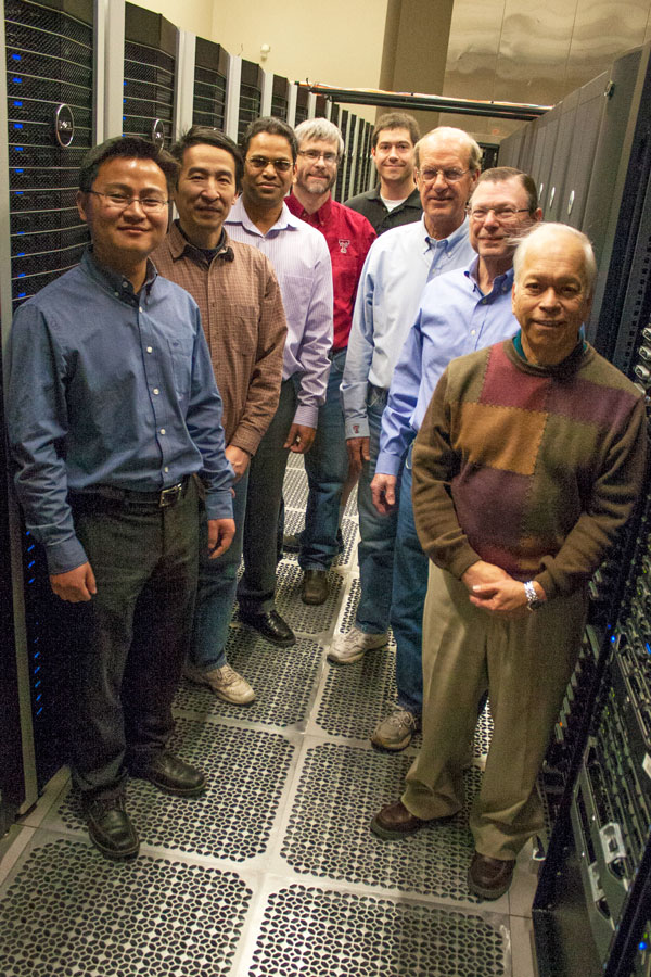 Team includes (l-r): Chen, Yu Zhuang, Rao Kottapalli, James Abbott, Brian Ancell, William L. Hase, Philip W. Smith, Noe Lopez-Benitez. (Not pictured: Ravi Vadapalli and Song-Lak Kang) Photo taken at High Performance Computing Center (HPCC)