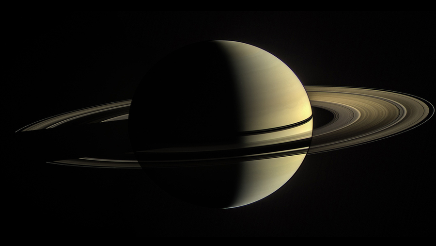 Caption:Scientists propose a lost moon of Saturn, which they call Chrysalis, pulled on the planet until it ripped apart, forming rings and contributing to Saturn’s tilt. Credits:Image: NASA/JPL-Caltech/Space Science Institute