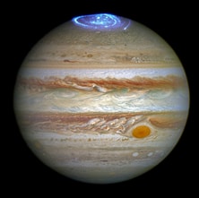 This 2016 image is a composite of two different Hubble observations. The auroras were photographed during a series of Hubble Space Telescope Imaging Spectrograph far-ultraviolet-light observations taking place as NASA's Juno spacecraft approaches and enters into orbit around Jupiter. Credits: NASA