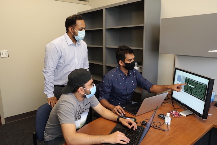 Tamzidul Hoque, assistant professor of electrical engineering & computer science, discusses a simulation of hardware attacks with his graduate and undergraduate mentees. Hogue will manage KU's portion of a $400,000 grant from the National Science Foundation to design course modules that train college students to build and maintain more secure computer hardware.  CREDIT Tamzidul Hoque