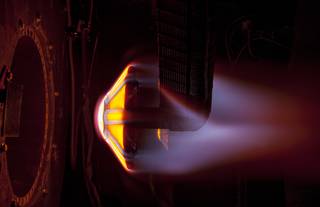 The Arc Jet Complex at NASA’s Ames Research Center in California’s Silicon Valley conducts heat simulation testing on a conceptual heat shield prototype. Credits: NASA