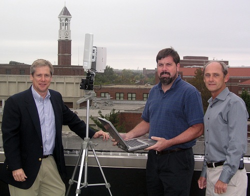 Lonnie D. Bentley, at right, a Purdue professor in the Department of Computer and Information Technology, stands with associate professors Anthony H. Smith and Michael D. Kane alongside technology from Broadband Antenna Tracking Systems Inc. Bentley received the 2011-2012 Outstanding Commercialization Award for Purdue University Faculty, established with an endowment gift from the Central Indiana Corporate Partnership Foundation. (Purdue Research Foundation file photo)