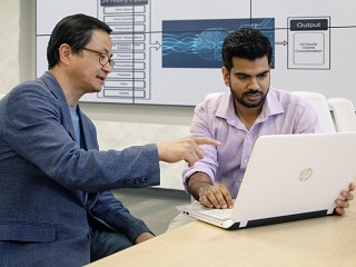 Yunsoo Choi, left, associate professor in the Department of Earth and Atmospheric Sciences at UH, and Ph.D. student Alqamah Sayeed explain a new model to better predict ozone levels.