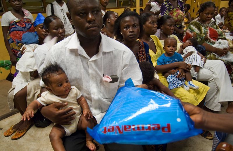 Families receiving malaria bed nets. Ghana. Photo: © Arne Hoel / The World Bank